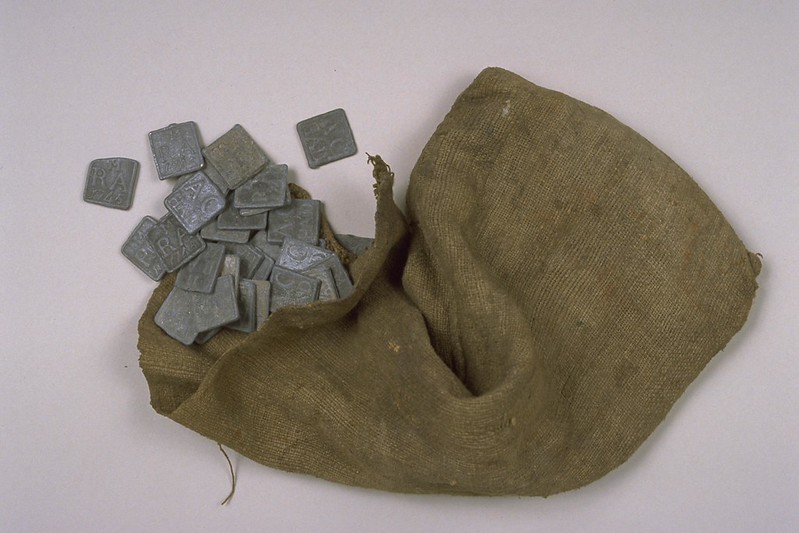 "Bag of communion tokens" by east_lothian_museums is licensed under CC BY-NC-SA 2.0.